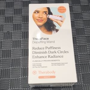 Therabody TheraFace Depuffing Wand - White and Black